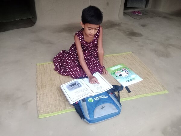 6. Khushi is using FH_s educatinal materials.jpg