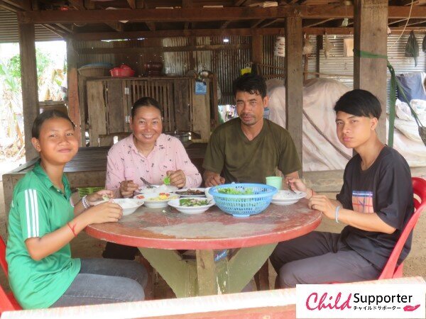 A child partner having lunch with his family.jpg